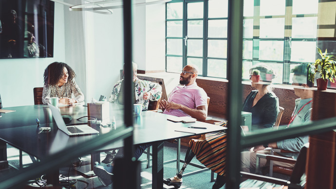 Diverse group of business professionals in office meeting
